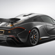 Illustration for article titled This Stealth Grey And Orange Bespoke McLaren P1 Is A Symphony Of Evil